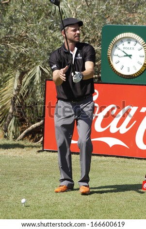 GIOVINAZZO , CARMINE  - NOVEMBER 17: Actor Guest Player Playing at Gary Player Charity Invitational Golf Tournament  November  17, 2013, Sun City, South Africa. Carmine tee-off on hole 1.