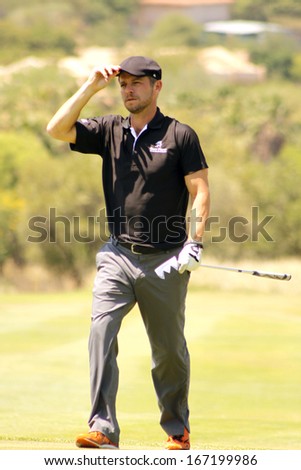 GIOVINAZZO , CARMINE  - NOVEMBER 17: Actor Guest Player Playing at Gary Player Charity Invitational Golf Tournament  November  17, 2013, Sun City, South Africa. Carmine walking down fairway.