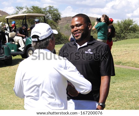 ANDERSON,  ANTHONY  - NOVEMBER 17: Actor Guest Player at Gary Player Charity Invitational Golf Tournament  November  17, 2013, Sun City, South Africa. Anthoney in frienly chat with Gary.