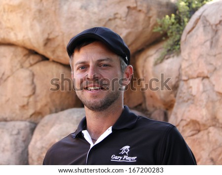 GIOVINAZZO , CARMINE  - NOVEMBER 17: Actor Guest Player Playing at Gary Player Charity Invitational Golf Tournament November 17, 2013, Sun City, South Africa. Carmine posing for picture before tee-off