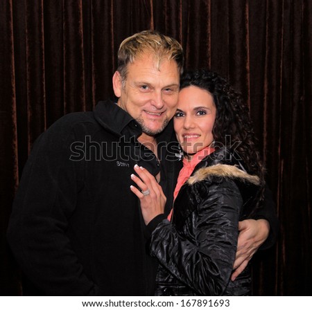 RUSTENBURG, SOUTH AFRICA - JULY 26: Singer, Songwriter and Actor, Steve Hofmeyr on July 26, 2013, Rustenburg, South Africa.  posing with fiance Janine van der Vyver.