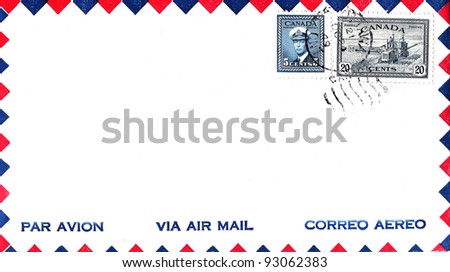 CANADA - CIRCA 1942: Stamps printed in Canada on Canadian air mail envelope shows King George VI and combine harvester with date stamp 1949, circa 1942