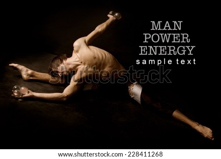 Athlete.Power.Energy.Gym.Men\'s sports figure on a black background.Sepia.