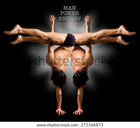 Figures gymnasts on a black background.Athletes.Handstand.C?olor image