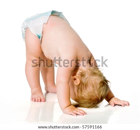 small child learning to walk.first steps.image on white background. toddler.