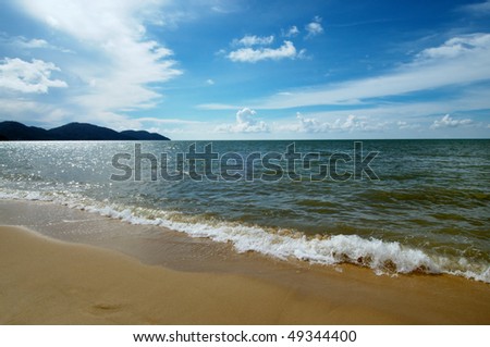 paradise beach in summer with blue sky and sand
