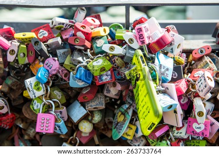SEOUL - March 14 : Love padlocks at N Seoul Tower or Locks of love is a custom in some cultures which symbolize their love will be locked forever at Seoul Tower on March14,2015 in seoul,Korea.