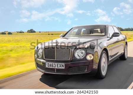 BERLIN CIRCA AUGUST 2014: Bentley Mulsanne drives along the road during the test drive event for automotive journalists from Eastern Europe.