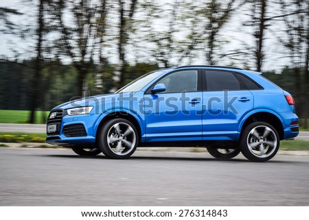 MINSK, BELARUS - MAY 6, 2015: 2015 model year Audi Q3 2.0 TFSI S-line at the test drive in Minsk, Belarus. Audi Q3 SUV is powered by 2.0 liter turbo, which produces 220 hp of power.