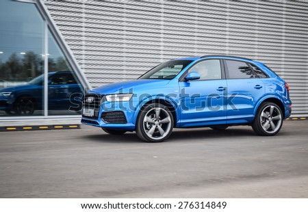 MINSK, BELARUS - MAY 6, 2015: 2015 model year Audi Q3 2.0 TFSI S-line at the test drive in Minsk, Belarus. Audi Q3 SUV is powered by 2.0 liter turbo, which produces 220 hp of power.