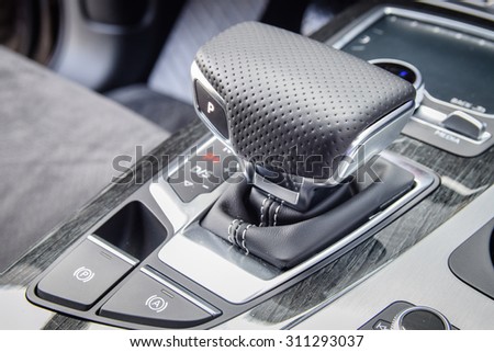 MINSK, BELARUS - AUGUST 28, 2015: close-up photo of a new style gear selector of automatic gearbox of the 2015 model year all-new Audi Q7 3.0 TFSI.