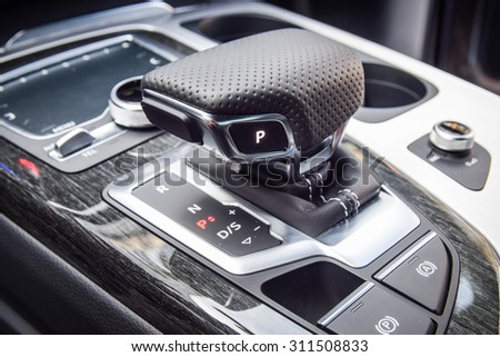 MINSK, BELARUS - AUGUST 28, 2015: close-up photo of a new style gear selector of automatic gearbox of the 2015 model year all-new Audi Q7 3.0 TFSI.