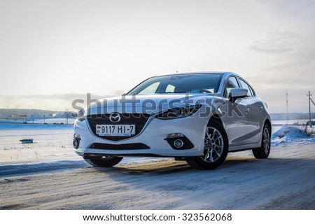 MINSK, BELARUS - JANUARY 10, 2014: All-new Mazda 3 2.0 Skyactiv at test-drive event in Minsk, Belarus. The new Mazda 3 is one of the best-handling cars in its class.