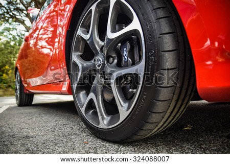 BIBAO, SPAIN - MARCH 28, 2015: 2015 model year Opel Corsa OPC at the test drive event on March 28, 2015 in Bilbao, Spain. Photo of the Brembo brakes and 18-inch rims.