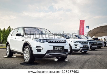 MINSK, BELARUS - JUNE 20, 2015: Test-drive event for 2015 model year Land Rover and Range Rover is held in Minsk, Belarus on June 20, 2015. British SUVs Land Rover Discovery Sport are on display.