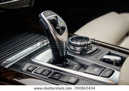 MINSK, BELARUS - MAY 6, 2015: close-up photo of a new style gear selector of automatic gearbox of the 2015 model year all-new BMW X5 M50d.