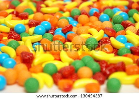 A variety of fruit flavored candies at a macro shot level.