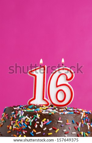 A number candle represents sixteen sweet years worth celebrating.