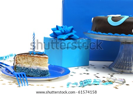 A scene out of a birthday party with a slice of cake.