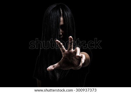 Halloween theme:Ghost Girl Horror isolated on black background.film filter effect.with clipping path.
