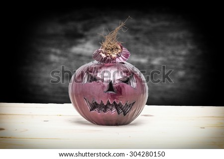 Halloween therm  Vegetables, onion on dark background with clipping path.film filter effect.vintage tone Retro filter effect.