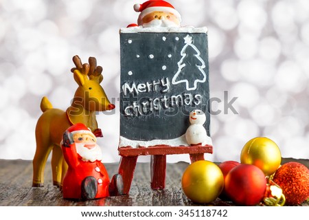 Christmas background of de-focused lights with decorated.space for text.(selective focus)