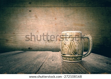beer mug on wood desk vintage