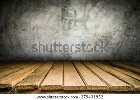 Wooden desk platform and polished concrete surface background