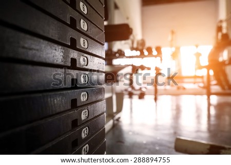 rusty weight stack in a gym