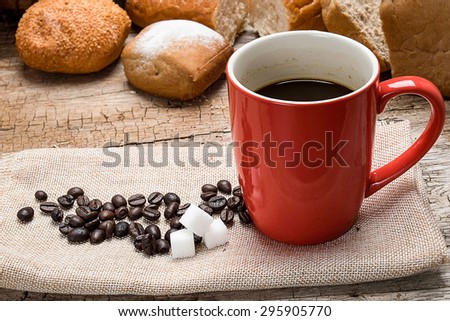 coffee and bread on wood table morning time