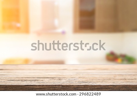 wood desk space and kitchen background. for product presentation