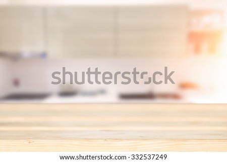 wood desk space and kitchen background. for product presentation.