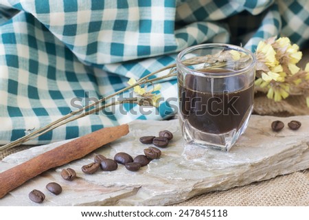 fresh roasted coffee and bean on rock