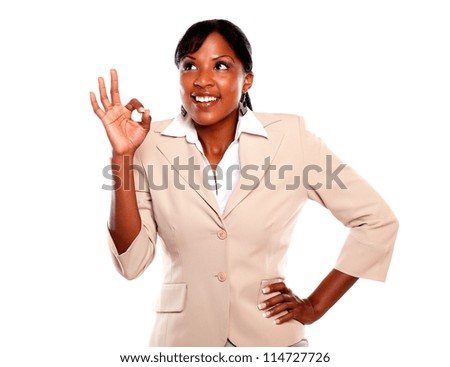 Happy adult businesswoman saying great job against white background