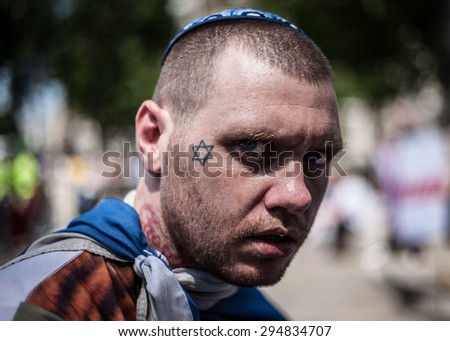 LONDON - JULY 4TH, 2015: Unidentified man protesting against a Neo-Nazi rally in Whitehall.