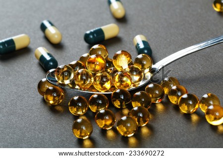 Medical capsules and tablets close up