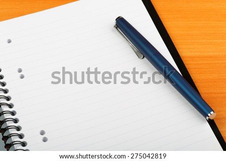 open notebook and pen for writing close-up