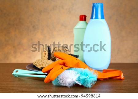 Gloves ,sponge, brush for ware washing on a table