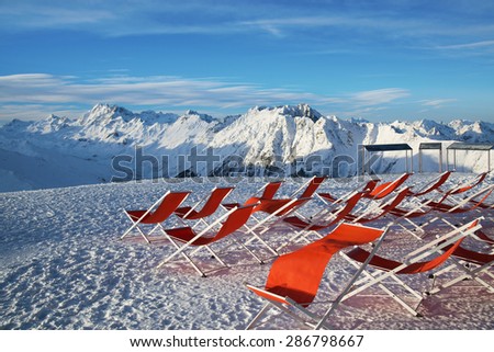 Chairs on the slopes of the mountains in the Alps, Austria.