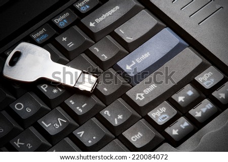 USB memory data stick on a computer Keyboard.