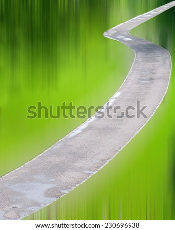 Empty asphalt footpath. Concept of hard road to success. Digitally manipulated with motion blur added.