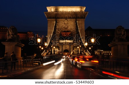 Szecheryi or Chain Bridge in Budapest by night with lion sculptures using long exposure