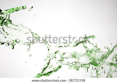 Splashing water. Green water isolated on white