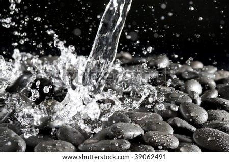 Background of rock and splashing water drop