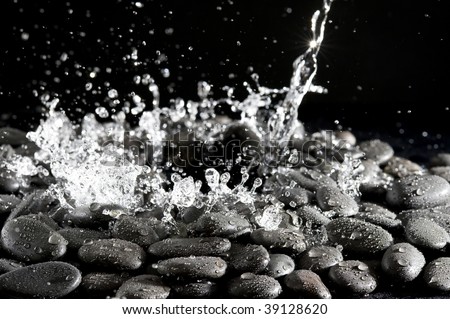 Background of rock and splashing water drop