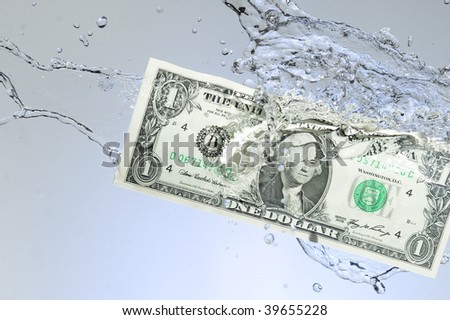 Dollar and creative splashing water