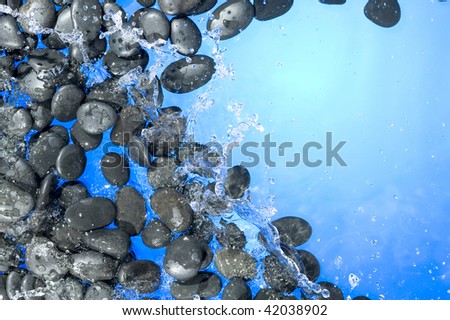 Rock and splashing water drop