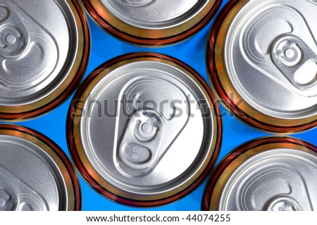 Shiny soda/beer cans viewed from above