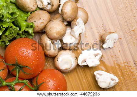Fresh vegetable on  board.Vegetarian food background with water drop