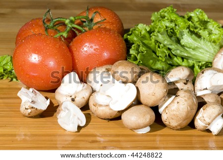 Fresh vegetable on  board.Vegetarian food background with water drop
